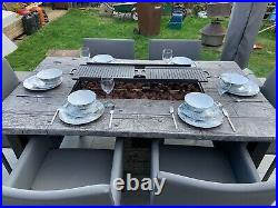 Unique table with gas fire pit and Bbq 6 chairs