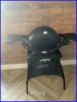 Weber Q1200 BBQ including stand and Weber cover