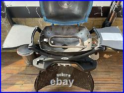 Weber Q1200 Blue bbq with transit cart and gas bottle extension and converter