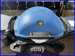 Weber Q1200 Blue bbq with transit cart and gas bottle extension and converter